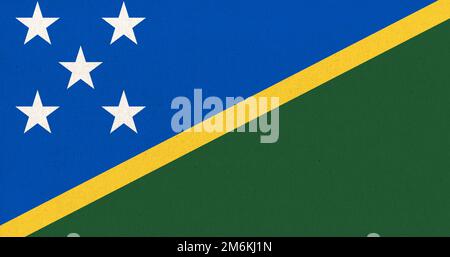Drapeau des Îles Salomon. Texture du tissu. Symbole national. Pays en Océanie Banque D'Images