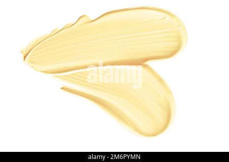 Nuance de beauté orange pastel, soin de la peau et maquillage échantillon de produit cosmétique texture isolée sur fond blanc, taches de maquillage, c Banque D'Images