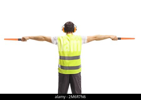 Vue arrière d'un signal de marshaler d'avion avec des baguettes isolées sur fond blanc Banque D'Images