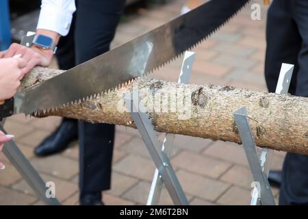 Détails d'un sawhorse avec log et vu à un mariage. Banque D'Images