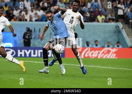 Darwin NUNEZ, Daniel AMARTEY en action pendant le match de groupe de la coupe du monde FIFA 2022 entre le Ghana et l'Uruguay, stade Al Janoub, Doha, 02/12/2022 avec: Darwin NUNEZ, Daniel AMARTEY où: Doha, Qatar quand: 02 déc 2022 crédit: Anthony Stanley/WENN Banque D'Images