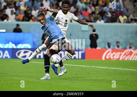 Darwin NUNEZ, Daniel AMARTEY en action pendant le match de groupe de la coupe du monde FIFA 2022 entre le Ghana et l'Uruguay, stade Al Janoub, Doha, 02/12/2022 avec: Darwin NUNEZ, Daniel AMARTEY où: Doha, Qatar quand: 02 déc 2022 crédit: Anthony Stanley/WENN Banque D'Images