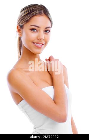 Shes a natural beauty. Studio shot of a beautiful young woman against a blue background. Stock Photo