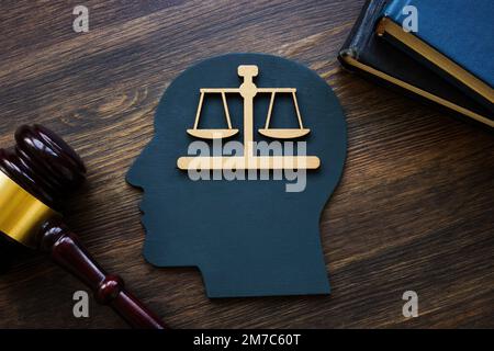 Forme de la tête, écailles et corps. Droit et enseignement juridique. Banque D'Images