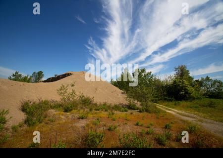 Gravier de construction de dépôts paysage avec des nuages Banque D'Images