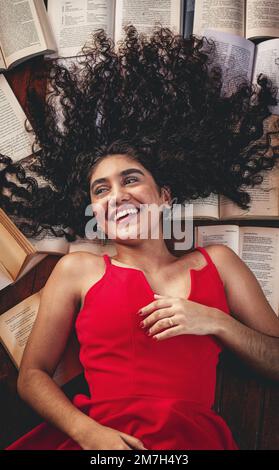 Une femme avec des livres Banque D'Images