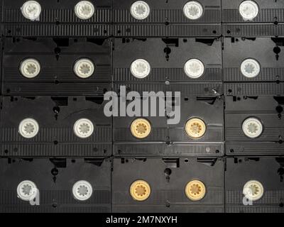 Arrière-plan d'anciennes cassettes VHS. Cassettes vidéo rétro. Gros plan. Banque D'Images