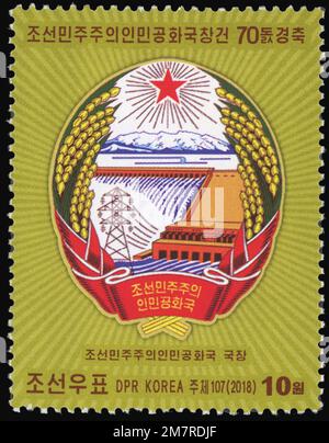 2018 cachet. Le 70th anniversaire de la République populaire démocratique de Corée. Emblème national Banque D'Images