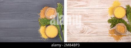 Millet dans bol en bois, de sacs et d'épillets vert sur le fond en bois noir avec l'exemplaire de l'espace pour votre texte. Vue d'en haut Banque D'Images