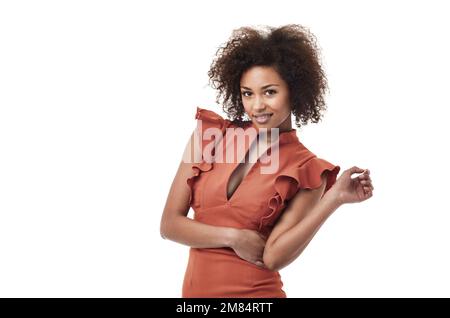 Vitreux et frais. Une magnifique femme ethnique avec une attitude assy souriant à l'appareil photo. Banque D'Images