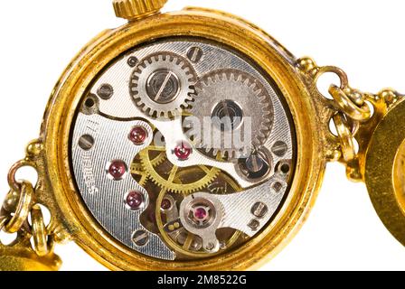An old wrist-watch clockwork isolated on white Banque D'Images