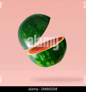 Pastèque coupée en tranches sur fond rose pastel. Concept d'été minimal. Banque D'Images