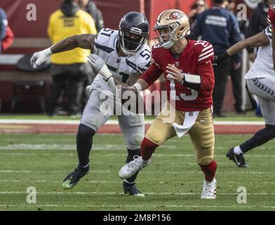 Seattle Seahawks linebacker Bruce Irvin (51) and Los Angeles Chargers  linebacker Khalil Mack (52) chat after an NFL football game, Sunday, Oct.  23, 2022, in Inglewood, Calif. (AP Photo/Kyusung Gong Stock Photo - Alamy