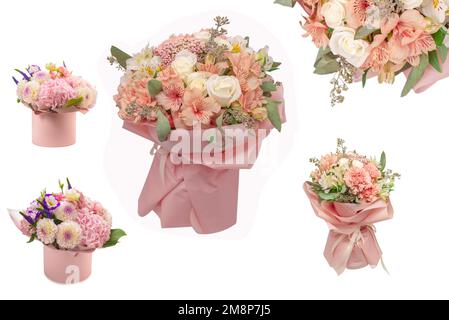 Bouquet de fleurs roses tendres en papier d'emballage rose. Banque D'Images