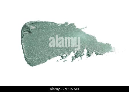 Échantillon de boue naturelle pour le visage, à usage cosmétique, isolé sur du blanc. Tache d'argile de la peau de près. Banque D'Images