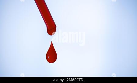 Une goutte de sang. Pipette. Liquide rouge qui s'égoutte. Une goutte de rouge. Tests, groupe sanguin. Banque D'Images