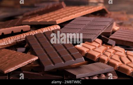 barres de chocolat noir au lait, nourriture savoureuse de fond Banque D'Images