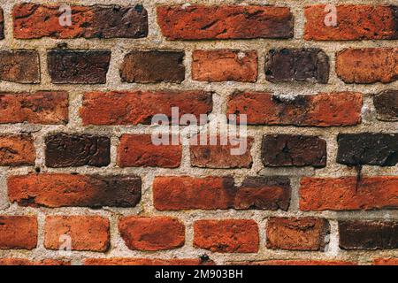 Mosaïque de mur de briques rustique vitrifié comme arrière-plan. Style scandinave de Halmstad en Suède. Banque D'Images