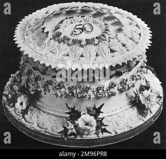 Gâteau de mariage doré avec moulure de pâte de gomme Banque D'Images