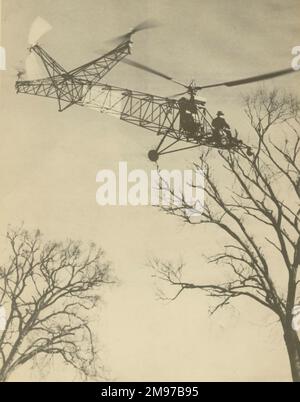 Igor Sikorsky aux commandes du Sikorsky VS-300 lors de son vol d'endurance record de 1 heures 5 minutes à Stratford. 15 avril 1941. Banque D'Images