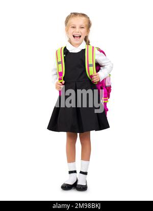 Petite fille blonde souriante dans l'uniforme de l'école isolée Banque D'Images