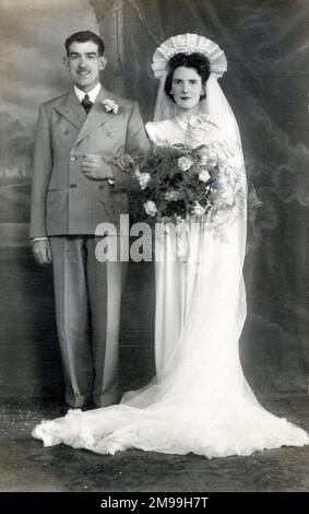 Photographie de mariage britannique - couple intelligent. Banque D'Images