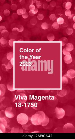 Arrière-plan Viva Magenta avec des scintillements flous. Couleur de l'année 2023. Banque D'Images