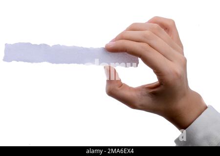 Main tenant un morceau de papier-notes déchiré vierge Banque D'Images