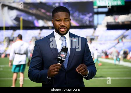 Cameron Wolfe of the NFL Network broadcasts during the NFL