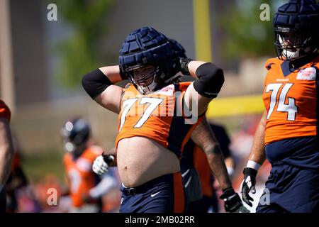 Denver Broncos guard Quinn Meinerz (77) takes part in drills during a  mandatory NFL football minicamp at the Broncos' headquarters Tuesday, June  13, 2023, in Centennial, Colo. (AP Photo/David Zalubowski Stock Photo -  Alamy