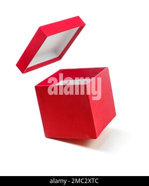 Boîte cadeau ouverte rouge isolée sur blanc Banque D'Images
