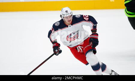 Alexandre Texier Columbus Blue Jackets Unsigned Navy Jersey Skating with Puck vs. Tampa Bay Lightning Photograph