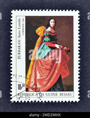 Timbre-poste annulé imprimé par la Guinée Bissau, qui montre la peinture Santa Casilda, F. Zurbaran, exposition philatélique mondiale - Espagne 84, vers 1984. Banque D'Images