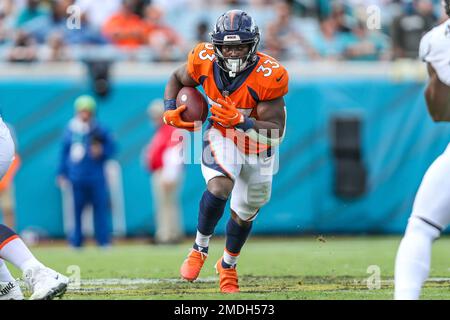 Denver Broncos running back Javonte Williams (33) runs against the Houston  Texans during an NFL football game Sunday, Sept. 18, 2022, in Denver. (AP  Photo/Jack Dempsey Stock Photo - Alamy