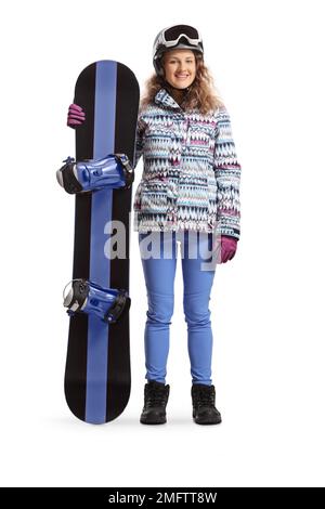 Portrait complet d'une femme avec snowboard debout et regardant l'appareil photo isolé sur fond blanc Banque D'Images