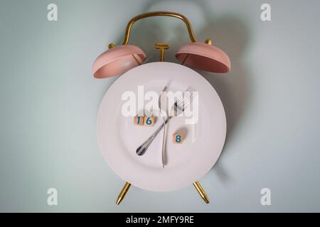 Concept de jeûne intermittent et protocole de 16 8 temps de manger restreint. Banque D'Images