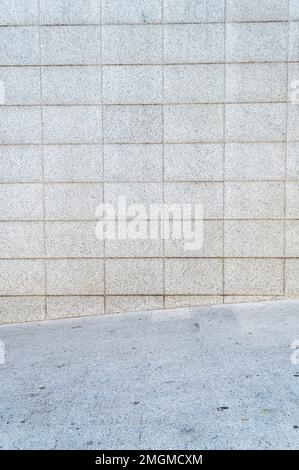 Mur gris à partir de blocs de pierre pour l'arrière-plan de la publicité. Banque D'Images