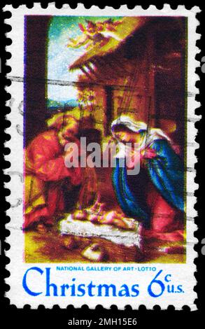 USA - VERS 1970: Un timbre imprimé aux Etats-Unis montre la "Nativité", par Lorenzo Lotto (1480-1556), National Gallery of Art, Washington, vers 1970 Banque D'Images