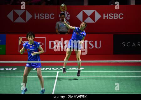 Jakarta, Indonésie. 27th janvier 2023. Fukushima Yuki (R)/Hirota Sayaka du Japon concourent lors du double quart-finale des femmes contre Tanisha Crasto/Ashwini Ponnappa de l'Inde au tournoi de badminton Indonesia Masters 2023 à Jakarta, Indonésie, le 27 janvier 2023. Credit: Xu Qin/Xinhua/Alamy Live News Banque D'Images