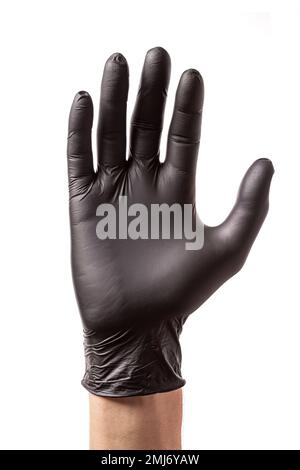 Main dans un gant en caoutchouc noir isolé sur fond blanc. Main levée comme symbole d'accord ou de soutien, conclusion Banque D'Images