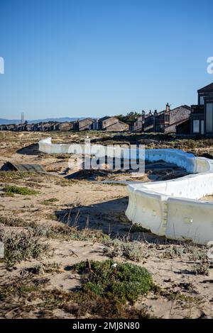 Les dégâts causés par les marées et les tempêtes le long de la colonie des dunes de Monterey Banque D'Images