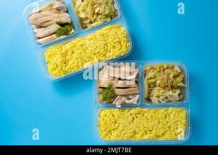 Vue de dessus deux paquets de riz au poulet Hainanese Banque D'Images