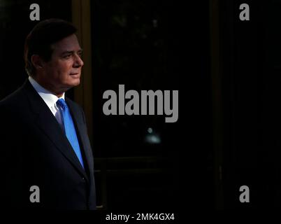 FILE - In this Oct. 30, 2017, file photo, Paul Manafort leaves Federal District Court in Washington. Manafort, President Donald Trump's former campaign chairman, and Manafort's business associate Rick Gates pleaded not guilty to felony charges of conspiracy against the United States and other counts. (AP Photo/Alex Brandon, File)