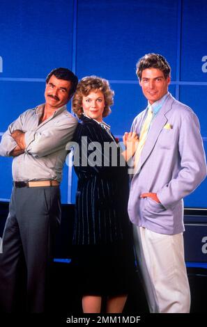 KATHLEEN TURNER, CHRISTOPHER REEVE et BURT REYNOLDS in SWITCHING CHANNELS (1988), dirigée par TED KOTCHEFF. Crédit : PHOTOS / Album TRISTAR Banque D'Images