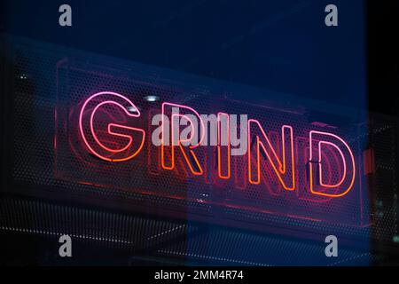 GRIND Neon signe pour le café à Canary Wharf Banque D'Images