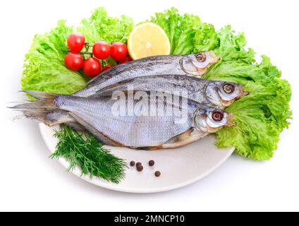 Groupe de poissons séchés à la plaque . Fruits De Mer Banque D'Images