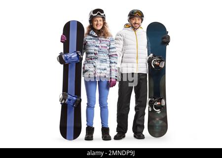 Portrait complet d'un jeune homme et d'une femme posant avec un équipement de snowboard isolés sur fond blanc Banque D'Images