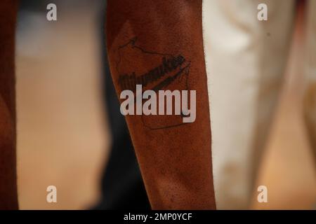 A tattoo on the leg of Golden State Warriors guard Jordan Poole, seen  before an NBA basketball game, Wednesday, March 30, 2022, in San Francisco.  (AP Photo/D. Ross Cameron Stock Photo - Alamy