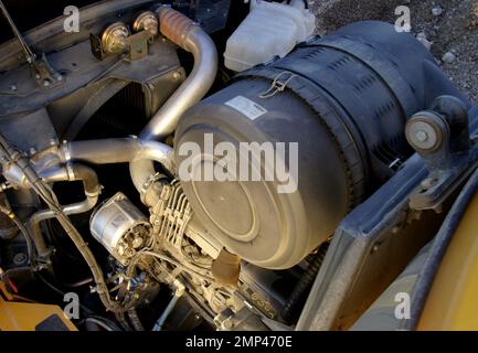Différentes machines dans une fosse de gravier. Voici un dumper Moxy MT 26 Highline. Banque D'Images