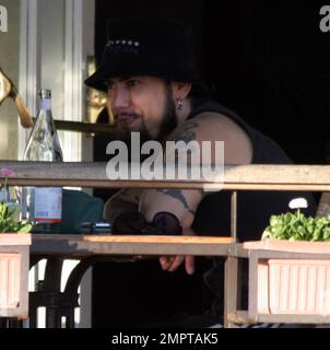 Exclusive!! Carmen Electra's hubby Dave Navarro has lunch in West Hollywood, Ca. with a friend and brings along his a designer Channel bag and sunglasses that would give Nicole Richie a run for her money. 1/5/06 Stock Photo